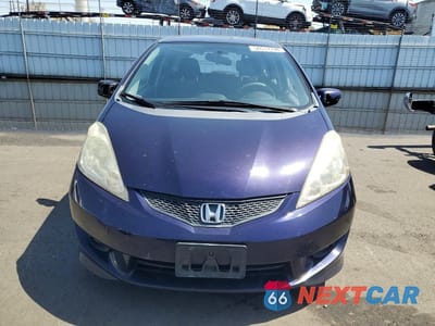 Piąte zdjęcie samochodu w środku: 2009 HONDA FIT VIN:JHMGE88439S015789 - miniatura