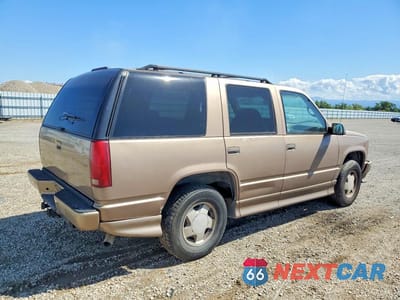 Trzecie zdjęcie samochodu z tyłu: 1996 GMC YUKON VIN:1GKEK13R3TJ737308 - miniatura