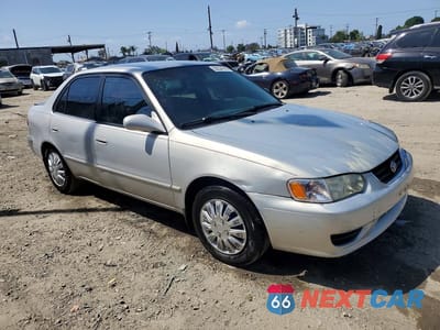 Czwarte zdjęcie samochodu z boku: 2002 TOYOTA COROLLA LE VIN:1NXBR12E22Z613404 - miniatura