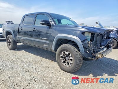 Czwarte zdjęcie samochodu z boku: 2016 TOYOTA TACOMA TRD OFF-ROAD VIN:3TMDZ5BN2GM005561 - miniatura
