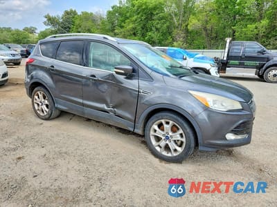 Czwarte zdjęcie samochodu z boku: 2015 FORD ESCAPE TITANIUM VIN:1FMCU0J95FUB45546 - miniatura