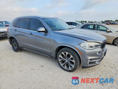 Czwarte zdjęcie samochodu z boku: 2014 BMW X5 SDRIVE35I VIN:5UXKR2C51E0H32650 - miniatura