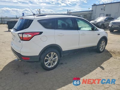 Trzecie zdjęcie samochodu z tyłu: 2018 FORD ESCAPE SE VIN:1FMCU9GDXJUC89165 - miniatura