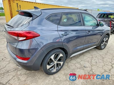 Trzecie zdjęcie samochodu z tyłu: 2018 HYUNDAI TUCSON VALUE VIN:KM8J33A27JU750238 - miniatura