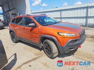 Czwarte zdjęcie samochodu z boku: 2015 JEEP CHEROKEE TRAILHAWK VIN:1C4PJMBB0FW634948 - miniatura