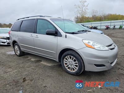 Czwarte zdjęcie samochodu z boku: 2010 TOYOTA SIENNA LE VIN:5TDJK4CC3AS032290 - miniatura