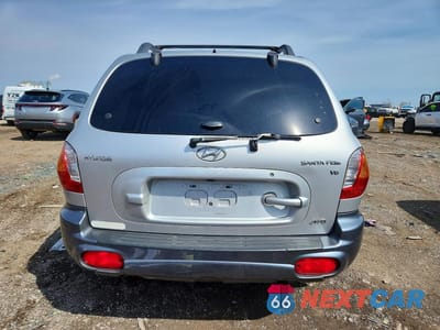 Zdjęcie 6 z 13 samochodu: 2003 HYUNDAI SANTA FE GLS VIN:KM8SC73D93U478210 - miniatura