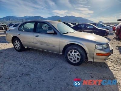 Czwarte zdjęcie samochodu z boku: 1999 NISSAN MAXIMA SE LIMITED VIN:JN1CA21AXXT104682 - miniatura