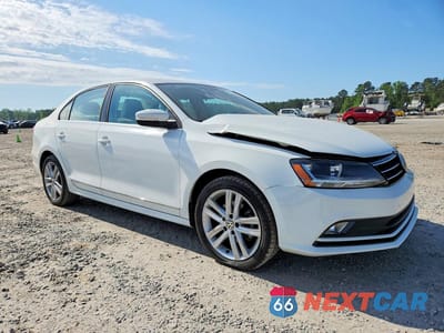 Czwarte zdjęcie samochodu z boku: 2017 VOLKSWAGEN JETTA SEL VIN:3VWL17AJ7HM222986 - miniatura