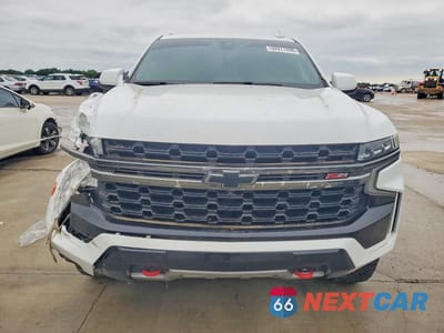 Piąte zdjęcie samochodu w środku: 2021 CHEVROLET TAHOE VIN:1GNSKPKD9MR128760 - miniatura