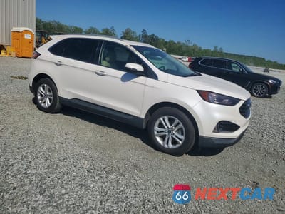 Czwarte zdjęcie samochodu z boku: 2019 FORD EDGE SEL VIN:2FMPK3J94KBC57182 - miniatura