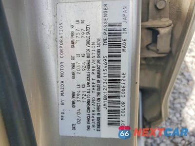 Zdjęcie 12 z 12 samochodu: 2004 MAZDA 3 I VIN:JM1BK12F341154695 - miniatura