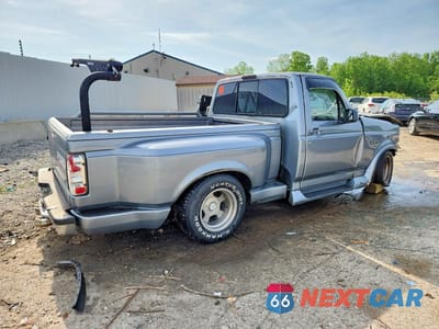 Trzecie zdjęcie samochodu z tyłu: 1994 FORD F150 VIN:1FTEF15NXRKA08798 - miniatura