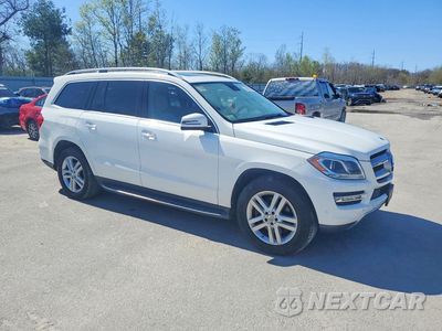 Czwarte zdjęcie samochodu z boku: 2015 MERCEDES-BENZ GL 450 4MATIC VIN:4JGDF6EE8FA522283 - miniatura