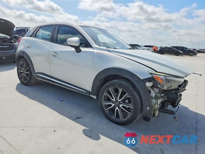 Czwarte zdjęcie samochodu z boku: 2017 MAZDA CX-3 GRAND TOURING VIN:JM1DKDD71H0160247 - miniatura
