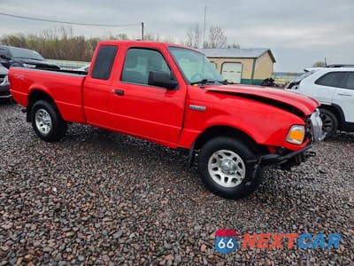 Czwarte zdjęcie samochodu z boku: 2011 FORD RANGER SUPER CAB VIN:1FTLR4FE1BPB14113 - miniatura