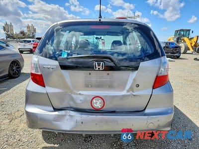 Zdjęcie 6 z 12 samochodu: 2010 HONDA FIT VIN:JHMGE8G25AC013623 - miniatura