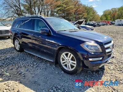 Czwarte zdjęcie samochodu z boku: 2014 MERCEDES-BENZ GL 350 BLUETEC VIN:4JGDF2EE2EA330882 - miniatura