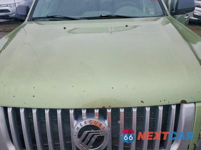 Zdjęcie 11 z 12 samochodu: 2008 MERCURY MARINER VIN:4M2CU81198KJ13950 - miniatura