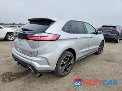 Trzecie zdjęcie samochodu z tyłu: 2019 FORD EDGE ST VIN:2FMPK4AP0KBC32638 - miniatura