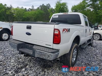 Trzecie zdjęcie samochodu z tyłu: 2015 FORD F350 SUPER DUTY VIN:1FT8W3B68FEA61497 - miniatura