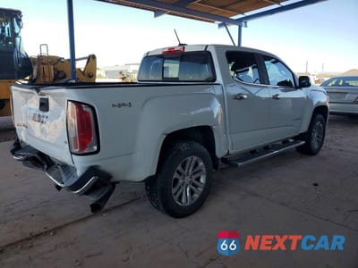 Trzecie zdjęcie samochodu z tyłu: 2018 GMC CANYON SLT VIN:1GTP6DE17J1182197 - miniatura