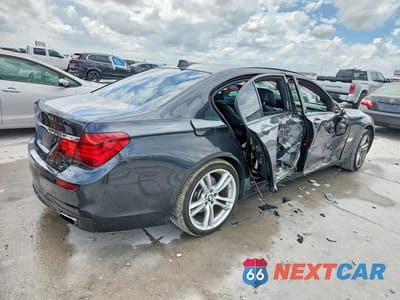 Trzecie zdjęcie samochodu z tyłu: 2014 BMW 740 LI VIN:WBAYE4C55ED137998 - miniatura