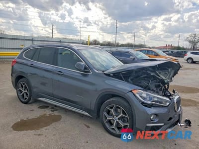 Czwarte zdjęcie samochodu z boku: 2017 BMW X1 XDRIVE28I VIN:WBXHT3C31H5F73737 - miniatura