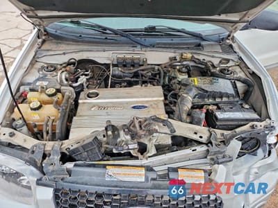 Zdjęcie 12 z 13 samochodu: 2005 FORD ESCAPE HEV VIN:1FMCU95H35KC30336 - miniatura