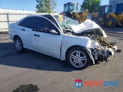 Czwarte zdjęcie samochodu z boku: 2001 FORD FOCUS SE VIN:1FAFP34P01W233332 - miniatura