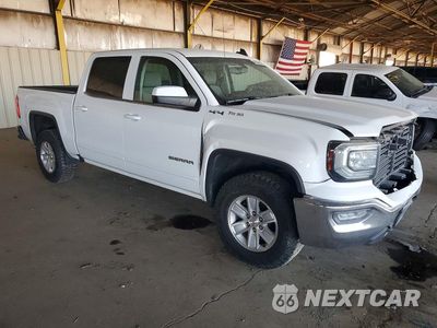 Czwarte zdjęcie samochodu z boku: 2018 GMC SIERRA K1500 SLE VIN:3GTU2MEC6JG401085 - miniatura