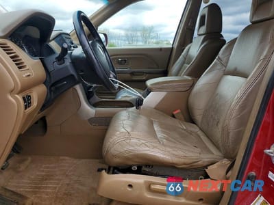 Zdjęcie 7 z 14 samochodu: 2004 HONDA PILOT EXL VIN:2HKYF18514H588930 - miniatura
