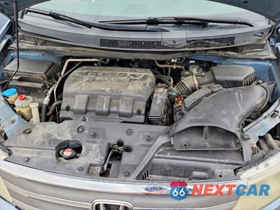 Zdjęcie 12 z 13 samochodu: 2011 HONDA ODYSSEY EXL VIN:5FNRL5H62BB080555 - miniatura