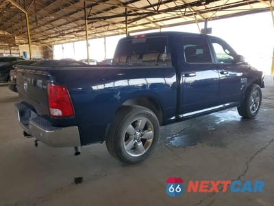 Trzecie zdjęcie samochodu z tyłu: 2018 RAM 1500 SLT VIN:1C6RR6LGXJS143530 - miniatura