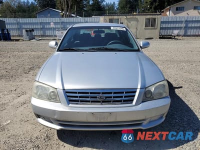 Piąte zdjęcie samochodu w środku: 2001 KIA OPTIMA LX VIN:KNAGD126115032175 - miniatura