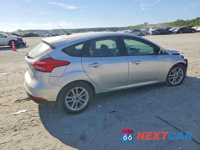 Trzecie zdjęcie samochodu z tyłu: 2017 FORD FOCUS SE VIN:1FADP3K2XHL267109 - miniatura