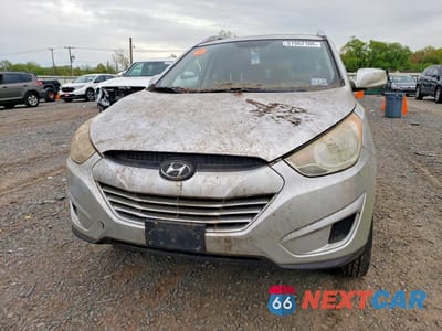 Piąte zdjęcie samochodu w środku: 2010 HYUNDAI TUCSON GLS VIN:KM8JUCAC8AU046409 - miniatura