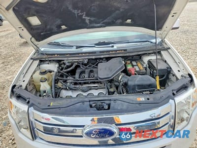 Zdjęcie 12 z 13 samochodu: 2009 FORD EDGE SEL VIN:2FMDK48C79BA82124 - miniatura