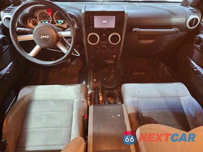 Zdjęcie 8 z 12 samochodu: 2010 JEEP WRANGLER UNLIMITED SAHARA VIN:1J4BA5H17AL116967 - miniatura