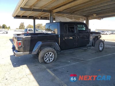 Trzecie zdjęcie samochodu z tyłu: 2023 JEEP GLADIATOR SPORT VIN:1C6HJTAG6PL529482 - miniatura