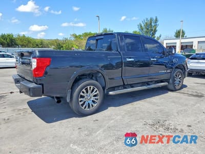 Trzecie zdjęcie samochodu z tyłu: 2017 NISSAN TITAN XD PLATINUM RESERVE VIN:1N6BA1F42HN561043 - miniatura