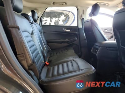 Zdjęcie 10 z 11 samochodu: 2016 FORD EDGE SEL VIN:2FMPK3J98GBC12107 - miniatura