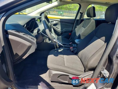 Zdjęcie 7 z 12 samochodu: 2017 FORD FOCUS SEL VIN:1FADP3M2XHL252462 - miniatura