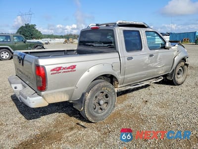 Trzecie zdjęcie samochodu z tyłu: 2001 NISSAN FRONTIER XE VIN:1N6ED27Y71C394191 - miniatura