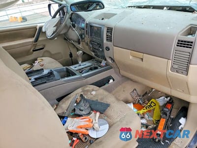 Zdjęcie 8 z 12 samochodu: 2011 NISSAN TITAN SV VIN:1N6AA0CC0BN323216 - miniatura