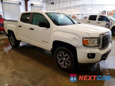 Czwarte zdjęcie samochodu z boku: 2016 GMC CANYON SLE VIN:1GTG6CE35G1141751 - miniatura