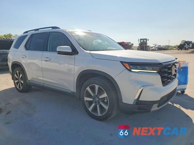 Czwarte zdjęcie samochodu z boku: 2025 HONDA PILOT TOURING VIN:5FNYG1H7XSB072723 - miniatura