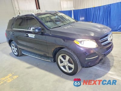 Czwarte zdjęcie samochodu z boku: 2016 MERCEDES-BENZ GLE 350 VIN:4JGDA5JB0GA703674 - miniatura