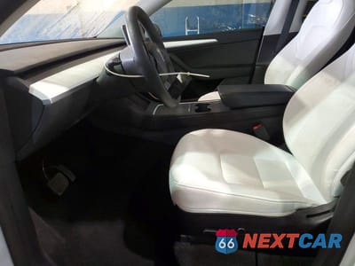 Zdjęcie 7 z 12 samochodu: 2022 TESLA MODEL Y VIN:7SAYGAEE0NF521885 - miniatura