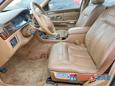 Zdjęcie 7 z 12 samochodu: 1999 CADILLAC DEVILLE CONCOURS VIN:1G6KF5490XU742854 - miniatura